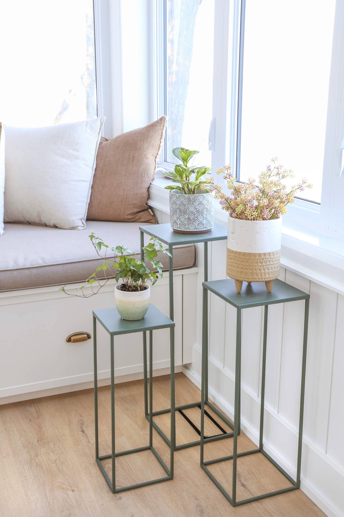 tall green plant stand