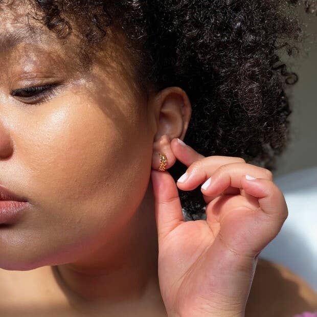 Fern leaf Huggie earrings in Gold