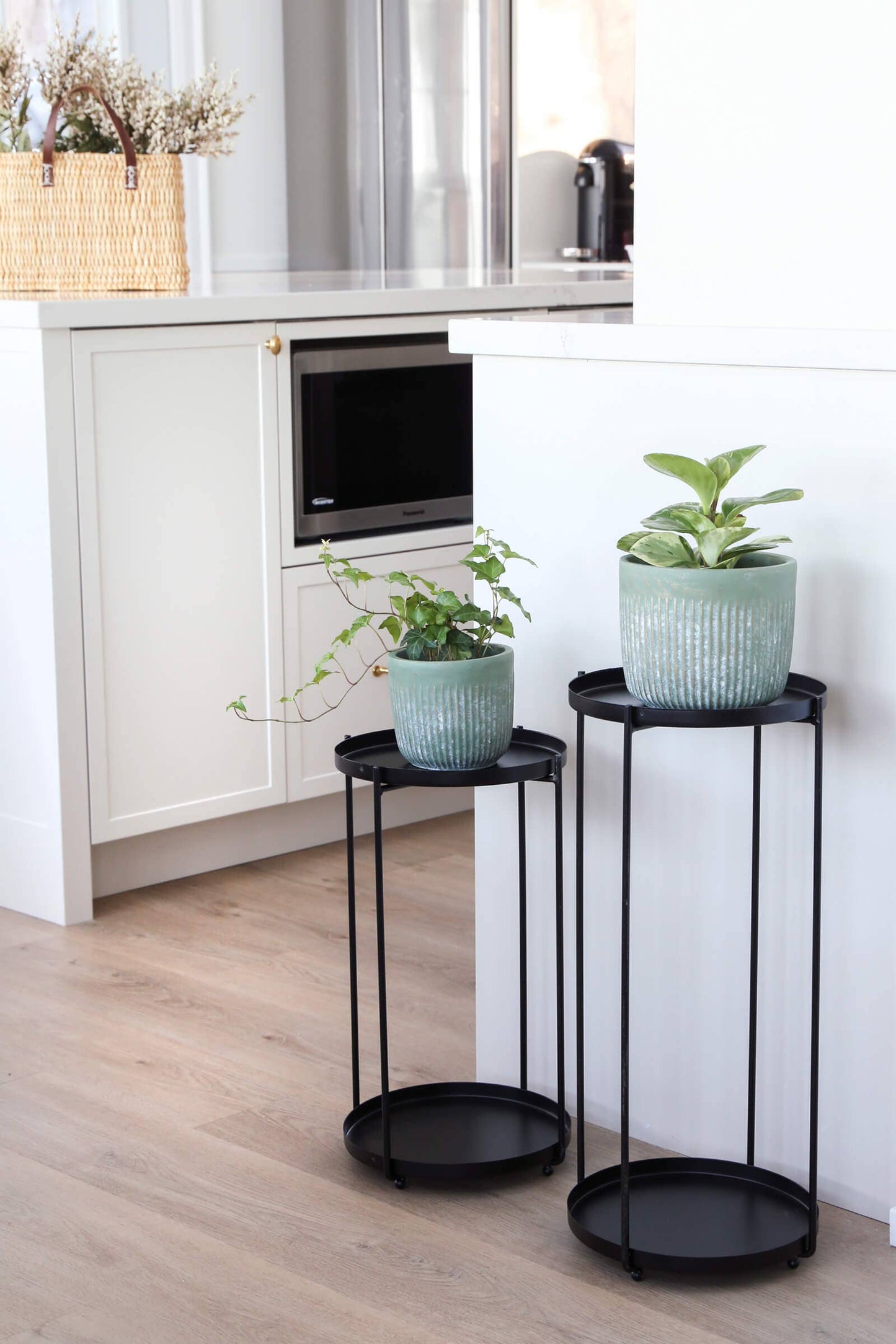 round black plant stands